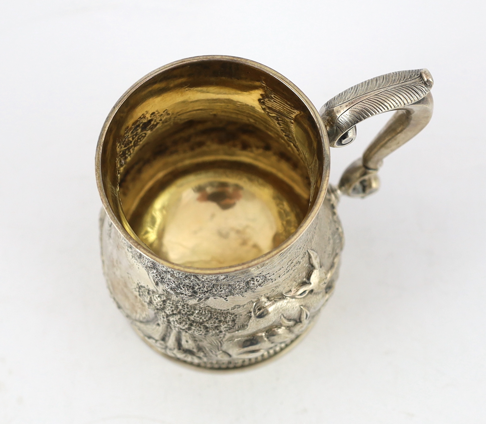 A George II silver baluster mug, by David Willaume II, later decorated with continuous countryside scene with hares and game birds